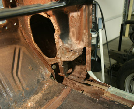 Inside view of door pillar sheet metal repair. Rust removal complete.