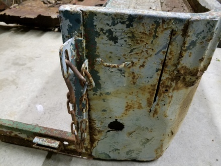 Crunched, rusted, repaired, re-rusted tub corner Willys Jeep