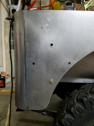 Cutting out extra wedge material Jeep CJ3a rear quarter
