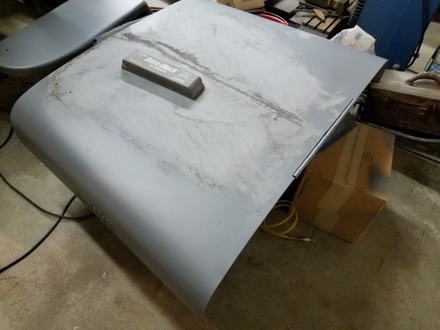 Sanding the 2K primer on the flatfender hood