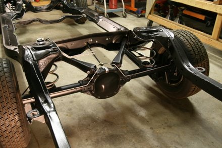 Rear axle and suspension installed on newly painted GTO frame