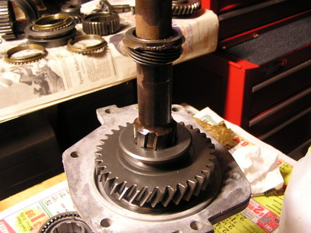 Install reverse gear and speedometer gear Muncie
